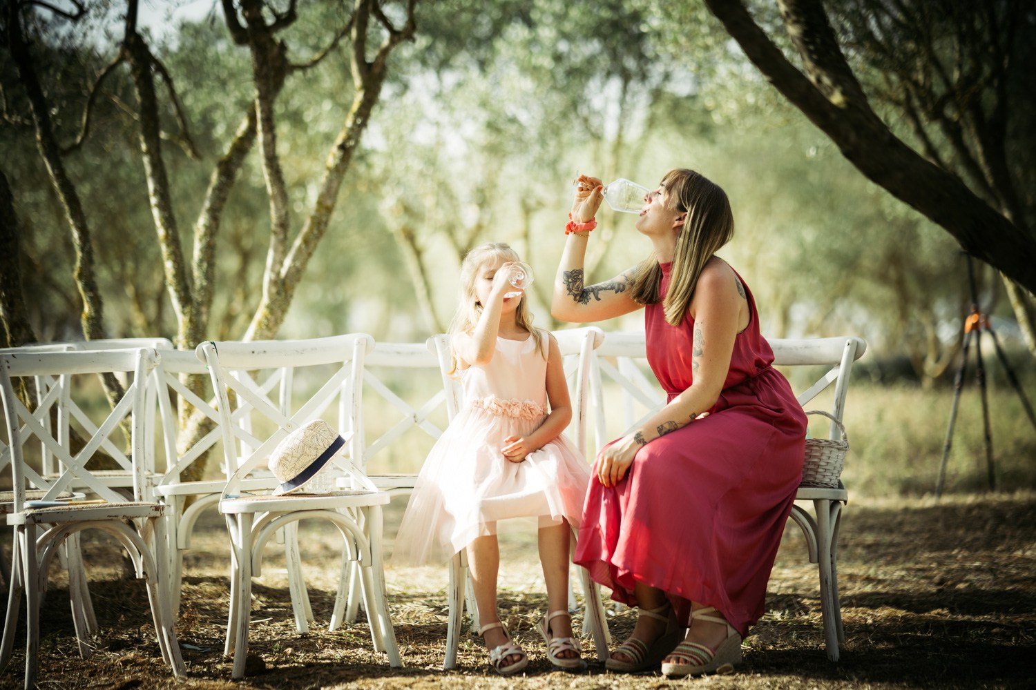 Bride sharing a quiet moment with another woman before the ceremony.