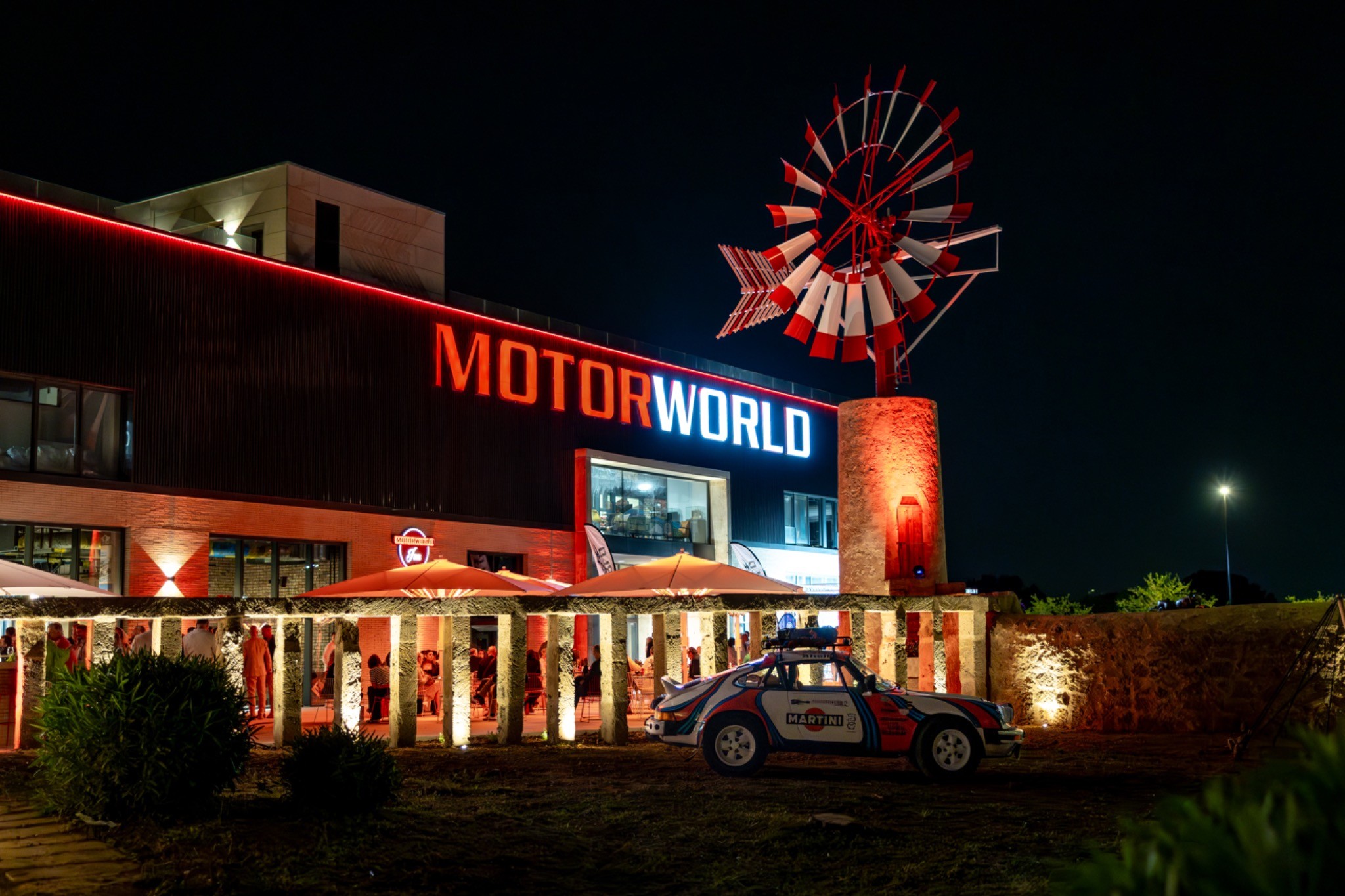 Motorworld Mallorca exterior illuminated at night after the opening event