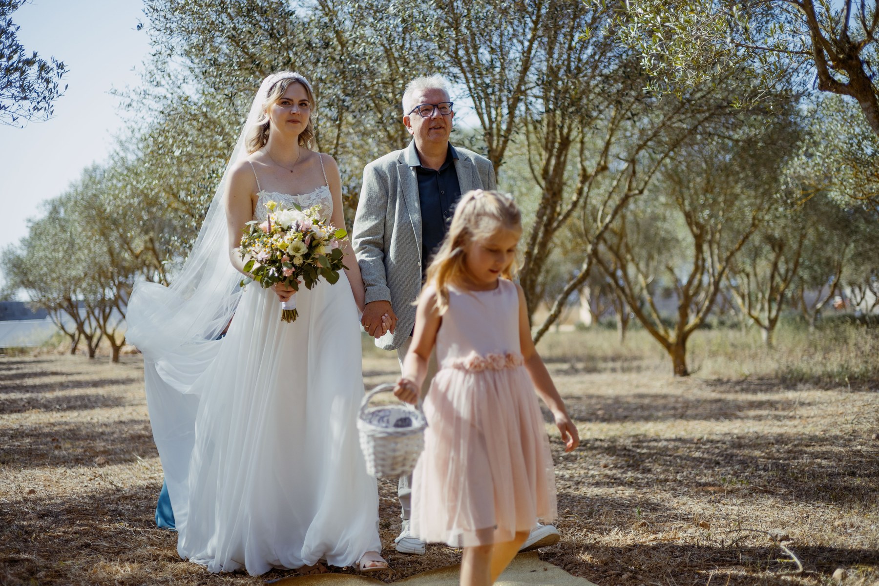 Annarina arriving for the outdoor wedding ceremony with family.