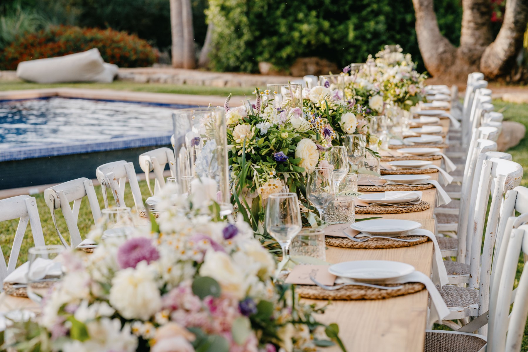 The wedding dinner table prepared outdoors in Mallorca.