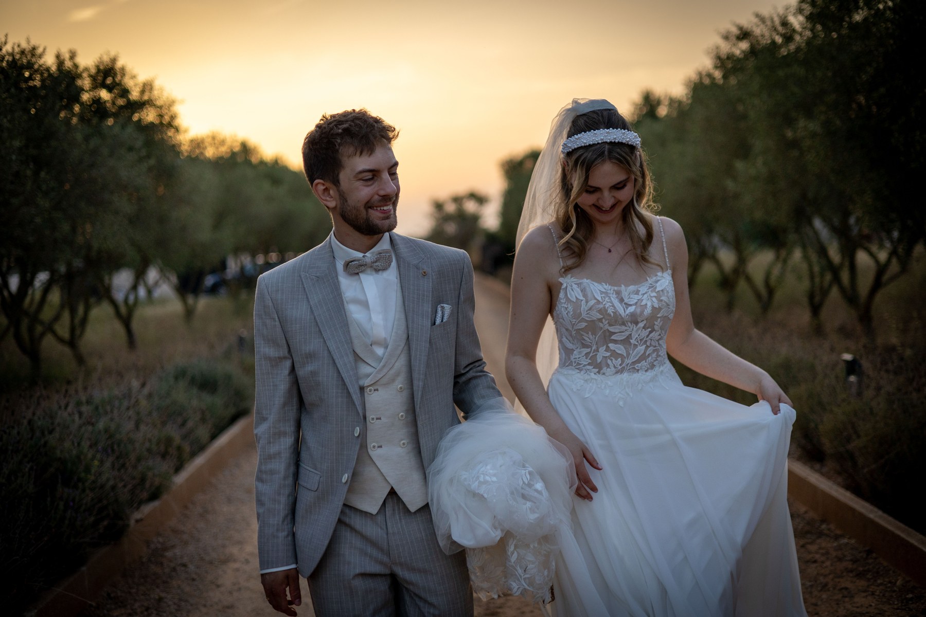 Annarina and Basti walking together as the light fades.