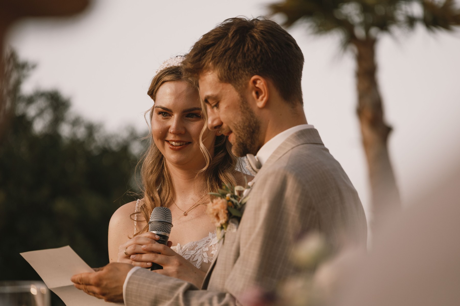 Annarina and Basti sharing a close moment during their wedding in Mallorca.